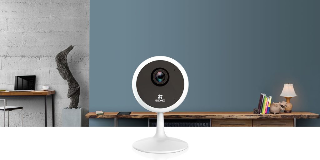 EZVIZ C1C indoor smart home camera sitting on a shelf